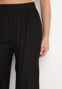 Born2be - Czarne Szerokie Spodnie Typu Palazzo z Wysokim Stanem Varlevi. Okazja: na co dzień. Stan: podwyższony. Kolor: czarny. Styl: elegancki, casual #7