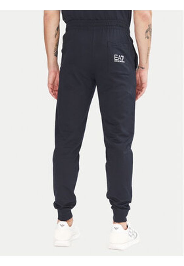 EA7 Emporio Armani Spodnie dresowe 7M000571 AF13512 MB149 Granatowy Regular Fit. Kolor: niebieski. Materiał: bawełna