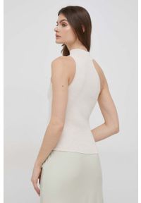 DKNY - Dkny top damski kolor beżowy z półgolfem. Typ kołnierza: dekolt halter. Kolor: beżowy. Materiał: dzianina #3
