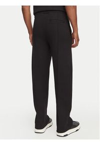 Hugo - HUGO Spodnie dresowe Dabinpant 50563020 Czarny Relaxed Fit. Kolor: czarny. Materiał: bawełna #2