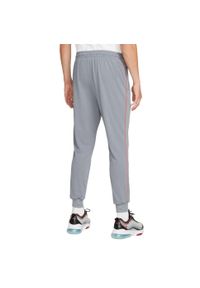 Nike - Męskie Spodnie Do Biegania FC Libero DriFIT. Kolor: szary. Materiał: dresówka