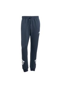 Adidas - Spodnie Future Icons 3-Stripes. Kolor: fioletowy. Materiał: materiał. Sport: fitness