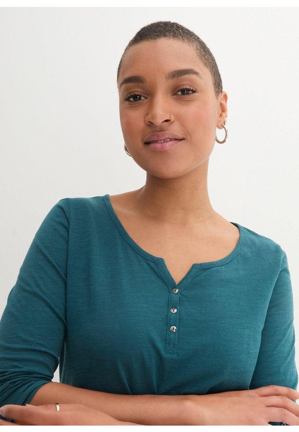 bonprix - Bluzka z plisą guzikową z czystej bawełny organicznej. Typ kołnierza: dekolt w serek. Kolor: niebieski. Materiał: bawełna. Długość rękawa: długi rękaw. Długość: długie