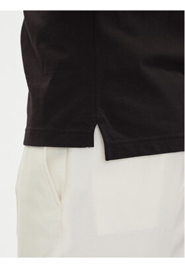 Emporio Armani Polo EM000571 AF12331 UC001 Czarny Regular Fit. Typ kołnierza: polo. Kolor: czarny. Materiał: bawełna