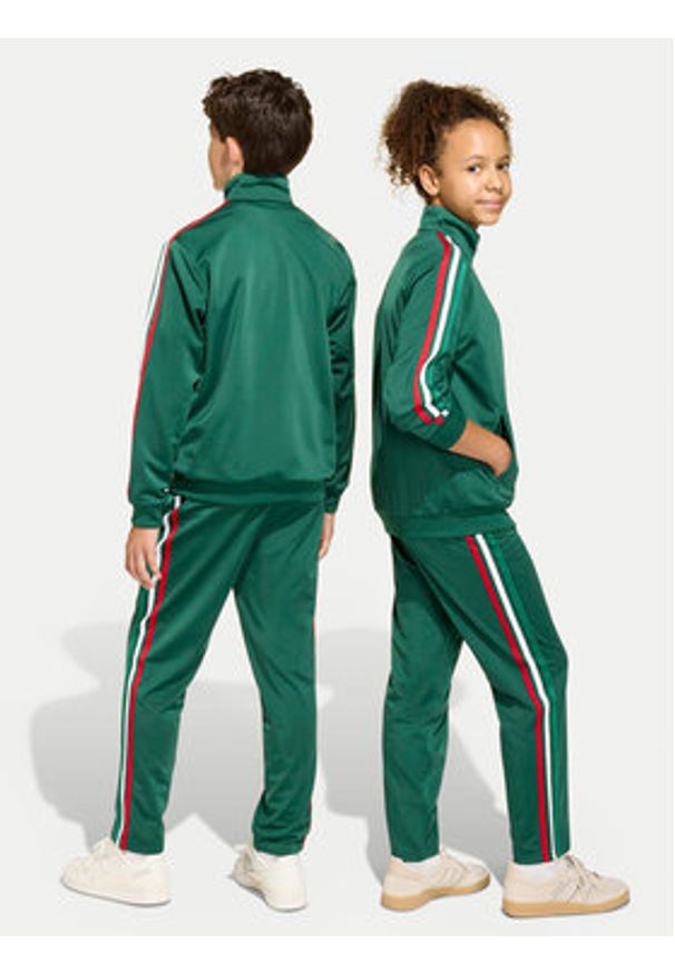 Adidas - adidas Spodnie dresowe Firebird KC9502 Zielony Regular Fit. Kolor: zielony. Materiał: syntetyk