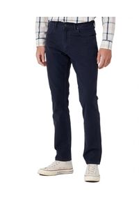 Wrangler - WRANGLER GREENSBORO MĘSKIE SPODNIE MATERIAŁOWE JEANSY DARK NAVY W15QDRXAE 112334235. Materiał: jeans, materiał