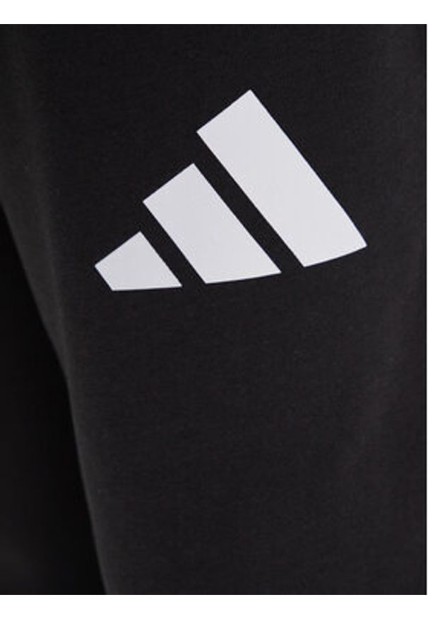 Adidas - adidas Spodnie dresowe Essentials JF3567 Czarny Loose Fit. Kolor: czarny. Materiał: bawełna