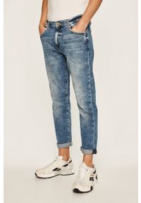 Tommy Jeans - Jeansy. Kolor: niebieski. Materiał: bawełna, denim, elastan. Wzór: aplikacja #1
