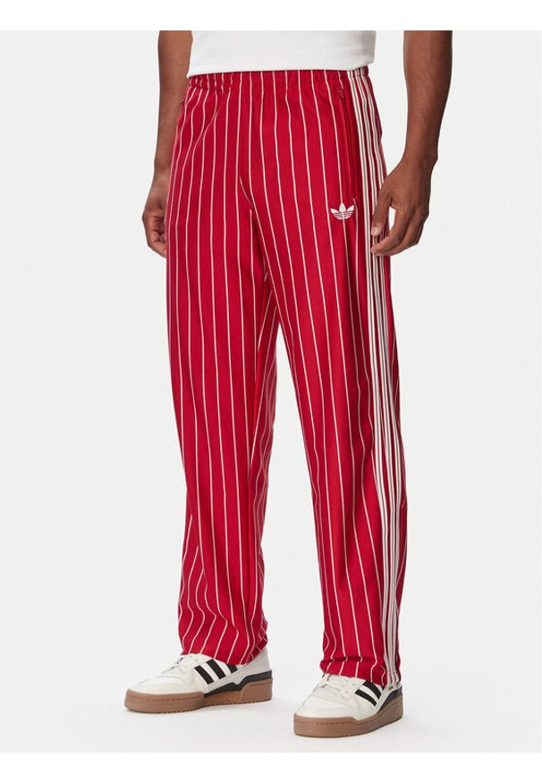 Adidas - adidas Spodnie dresowe Firebrid Pinstripes Track KR7230 Czerwony Regular Fit. Kolor: czerwony. Materiał: syntetyk