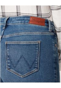 Wrangler - SPODNIE DAMSKIE WRANGLER BOOTCUT MADAGASKAR W28BTX10A