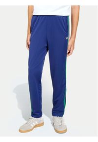 Adidas - adidas Spodnie dresowe Firebird KC9503 Niebieski Regular Fit. Kolor: niebieski. Materiał: syntetyk #7