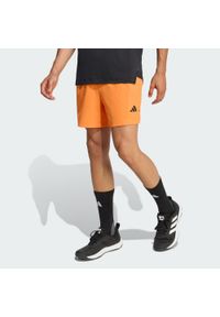 Adidas - Szorty D4T Essentials. Kolor: pomarańczowy. Technologia: ClimaCool (Adidas). Sport: fitness #1