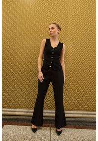 MOODO - Spodnie dzwony czarne. Kolor: czarny. Materiał: poliester, elastan, wiskoza #1