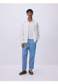 Reserved - Jeansy carrot fit - niebieski. Kolor: niebieski