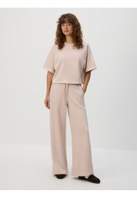 Reserved - Bawełniane spodnie dresowe - pastelowy róż. Kolor: różowy. Materiał: bawełna, dresówka #1