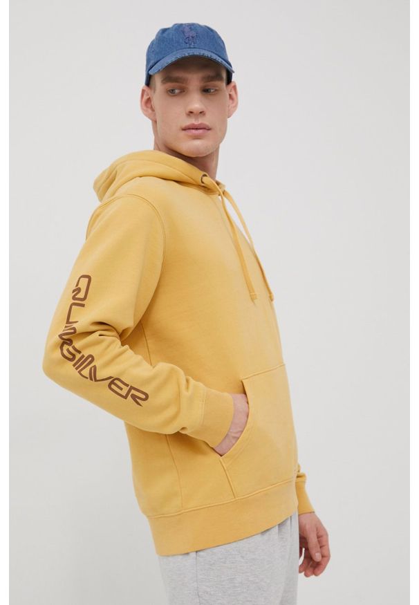 Quiksilver bluza męska kolor żółty z kapturem z nadrukiem. Okazja: na co dzień. Typ kołnierza: kaptur. Kolor: żółty. Materiał: dzianina. Wzór: nadruk. Styl: casual