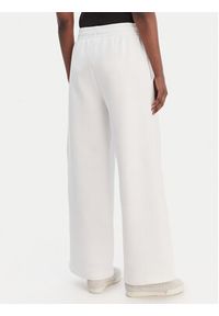 Lacoste Spodnie dresowe XF0041 Biały Relaxed Fit. Kolor: biały. Materiał: bawełna #4