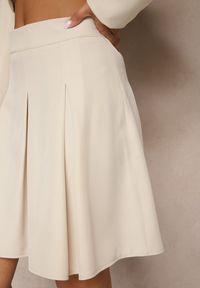Renee - Beżowa Plisowana Spódnica High Waist o Rozkloszowanym Kroju Redilsa. Stan: podwyższony. Kolor: beżowy. Styl: elegancki #5