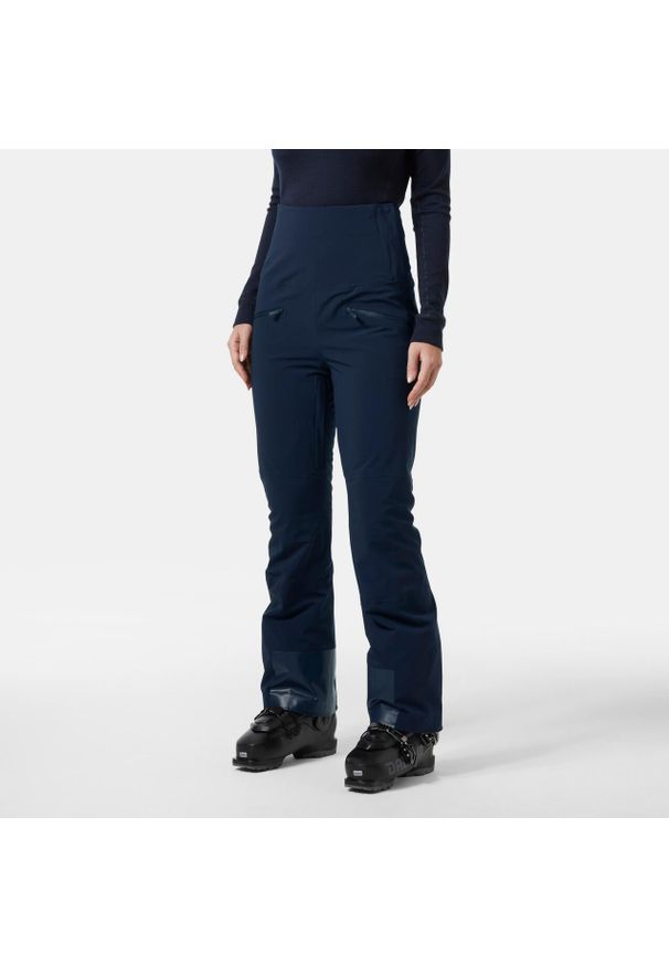 Spodnie narciarskie dla kobiet Helly Hansen Alphelia Hi Waist. Kolor: niebieski. Sezon: zima. Sport: narciarstwo