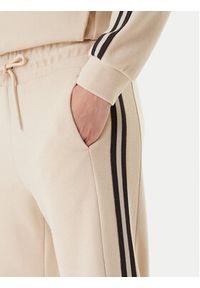 EA7 Emporio Armani Spodnie dresowe 7W000568 AF15528 U1046 Beżowy Relaxed Fit. Kolor: beżowy. Materiał: syntetyk #4