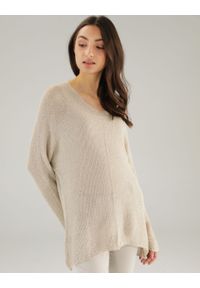 Unisono - POŁYSKUJĄCY SWETER J23092 BEIGE. Materiał: akryl, nylon