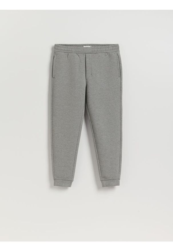 Reserved - Spodnie dresowe slim fit - jasnoszary. Kolor: szary. Materiał: dresówka