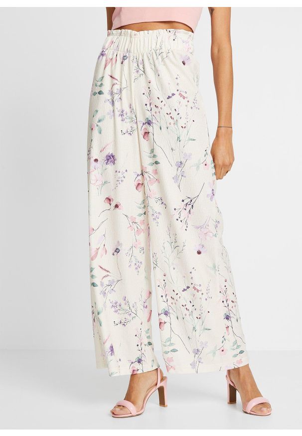 bonprix - Spodnie z dżerseju z przewiewnej krepy. Kolor: beżowy. Materiał: jersey. Wzór: kwiaty