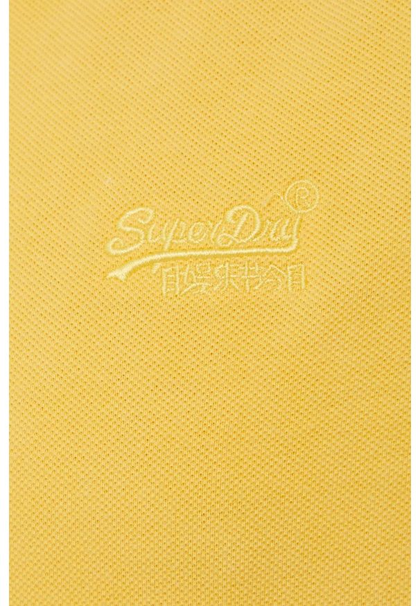 Superdry polo bawełniane kolor żółty gładki. Typ kołnierza: polo. Kolor: żółty. Materiał: bawełna. Długość: krótkie. Wzór: gładki