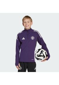 Adidas - Bluza Manchester United Tiro 25 Competition Training Kids. Kolor: fioletowy, biały, wielokolorowy, czarny. Materiał: dresówka. Sport: piłka nożna