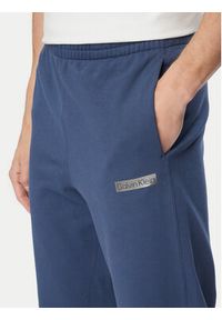Calvin Klein Spodnie dresowe LV04LG212G Granatowy Regular Fit. Kolor: niebieski. Materiał: bawełna #4