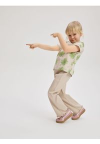 Reserved - Prążkowane spodnie - beżowy. Kolor: beżowy. Materiał: prążkowany #1