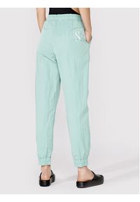 Simple Spodnie dresowe SPD010 Zielony Relaxed Fit. Kolor: zielony. Materiał: syntetyk #4