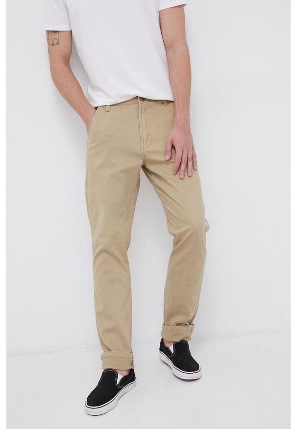 Wrangler - Spodnie. Kolor: beżowy. Materiał: tkanina. Wzór: gładki