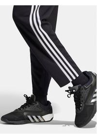 Adidas - adidas Spodnie dresowe Train Essentials HZ5646 Czarny Loose Fit. Kolor: czarny. Materiał: syntetyk #3