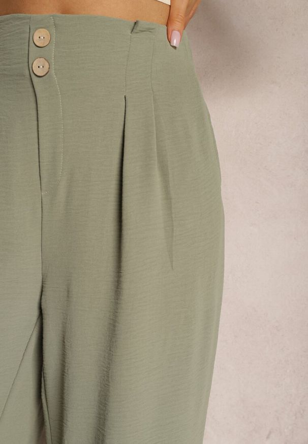 Renee - Ciemnozielone Spodnie w Stylu Alladynek High Waist Wykończone Gumką w Pasie Riselma. Okazja: na co dzień. Stan: podwyższony. Kolor: zielony. Styl: sportowy, casual