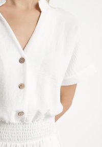 Born2be - Biały Kombinezon z Wiskozy z Gumką w Talii i Dekoltem w Serek z Guzikami Nisella. Okazja: na co dzień. Kolor: biały. Materiał: wiskoza. Długość rękawa: krótki rękaw. Długość: krótkie. Styl: casual, elegancki #6