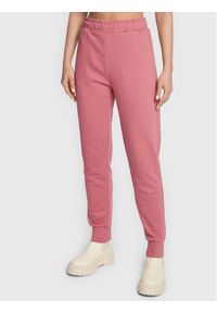 outhorn - Outhorn Spodnie dresowe TTROF041 Różowy Relaxed Fit. Kolor: różowy. Materiał: bawełna #1