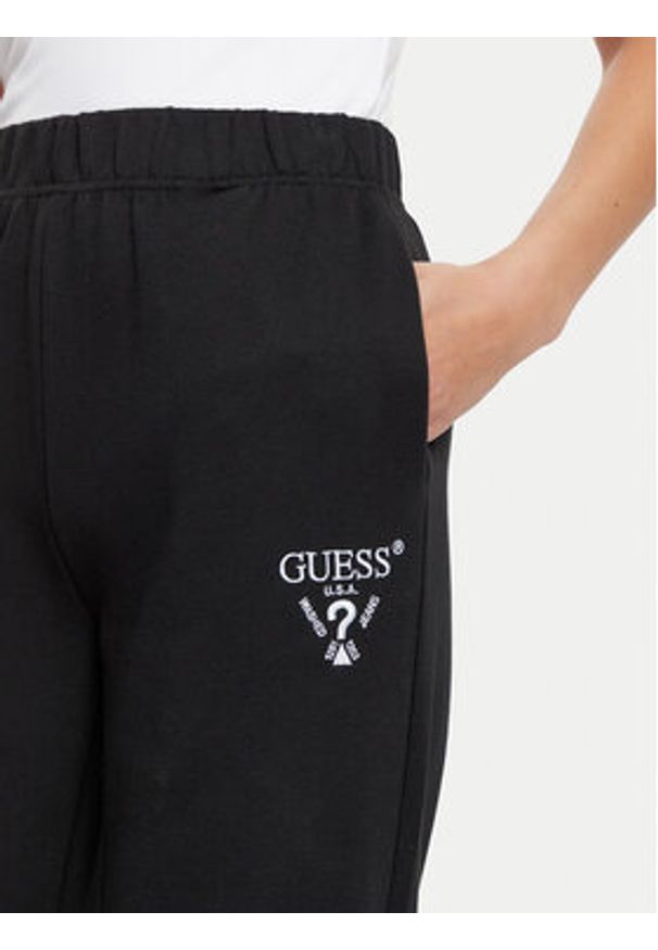 Guess Spodnie dresowe V5RB12 KC3D2 Czarny Regular Fit. Kolor: czarny. Materiał: bawełna