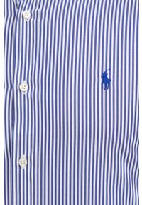 Polo Ralph Lauren koszula męska kolor granatowy slim z kołnierzykiem button-down. Typ kołnierza: polo, button down. Kolor: niebieski. Materiał: tkanina. Długość rękawa: długi rękaw. Długość: długie