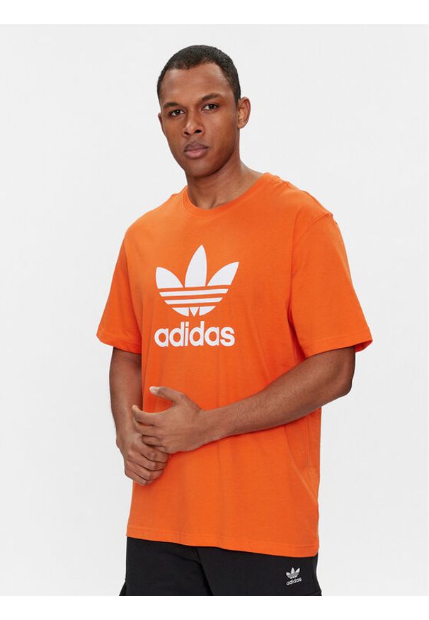 Adidas - adidas T-Shirt adicolor Trefoil IR8000 Pomarańczowy Regular Fit. Kolor: pomarańczowy. Materiał: bawełna