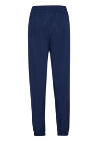 Dziecięce spodnie dresowe Hummel. Kolor: niebieski, zielony, wielokolorowy. Materiał: dresówka. Sport: joga i pilates