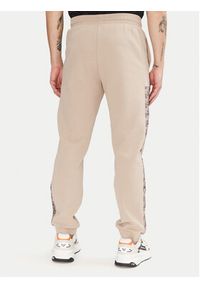 EA7 Emporio Armani Spodnie dresowe 7M000216 AF12660 U6155 Beżowy Regular Fit. Kolor: beżowy. Materiał: syntetyk, bawełna #3