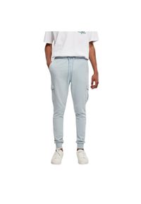 Dopasowane spodnie dresowe cargo Urban Classics. Kolor: niebieski. Materiał: dresówka #1