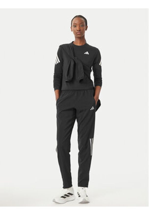 Adidas - adidas Spodnie dresowe Astro KC4947 Czarny Regular Fit. Kolor: czarny. Materiał: syntetyk
