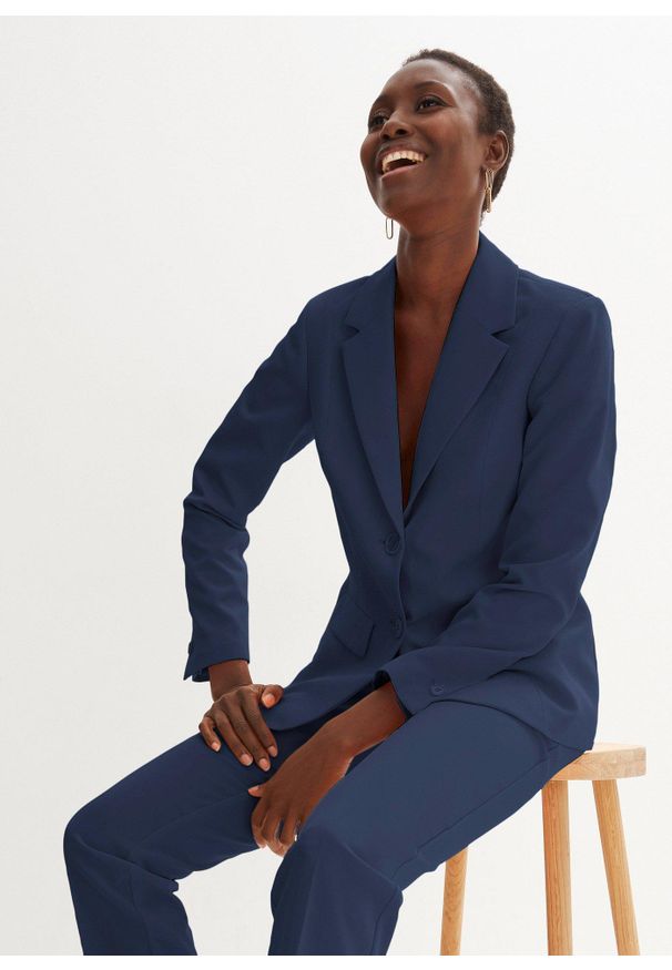 bonprix - Spodnium. Kolor: niebieski. Styl: klasyczny, elegancki