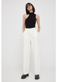 DKNY - Dkny top P2ASAA41 damski kolor czarny z półgolfem. Typ kołnierza: dekolt halter. Kolor: czarny. Materiał: dzianina #6