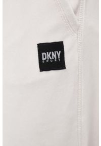 DKNY - Dkny spodnie dresowe kolor beżowy gładkie. Kolor: beżowy. Materiał: dresówka. Wzór: gładki #3