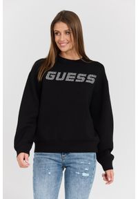 Guess - GUESS Czarna damska bluza z cyrkoniami Cecilia. Typ kołnierza: bez kaptura. Kolor: czarny. Materiał: wiskoza, poliamid, elastan, materiał. Długość rękawa: długi rękaw. Długość: długie. Wzór: aplikacja. Styl: elegancki