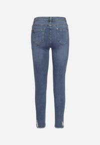 Born2be - Niebieskie Jeansy Skinny z Przetarciami Ridanca. Kolor: niebieski