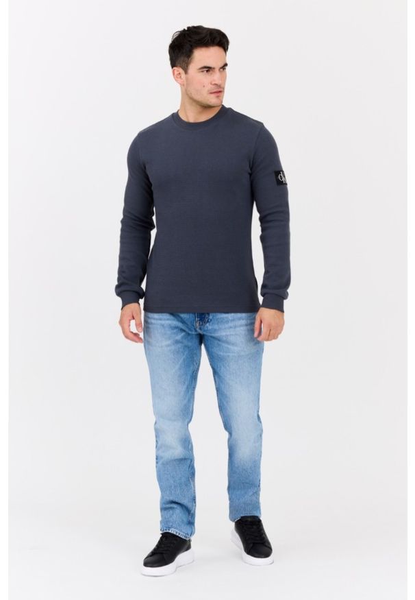 Calvin Klein - CALVIN KLEIN Błękitne męskie jeansy Slim Straight. Kolor: niebieski